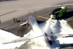 Plane catches fire after making emergency landing at Miami airport: A jetliner carrying 126 people caught fire after landing Tuesday at Miami International Airport when the front landing gear collapsed, but no serious injuries were reported, authorities said.